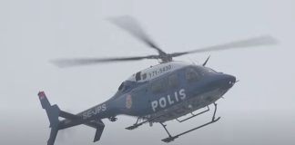 Police Chopper in Search of attackers