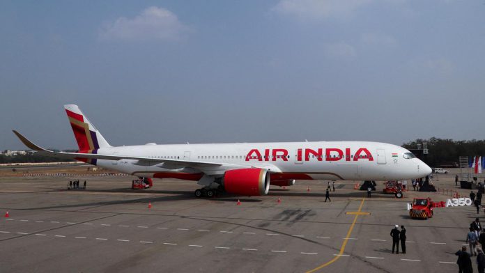 2026-08-05T130201Z_911165123_RC2DK5ASTM2P_RTRMADP_3_AIR-INDIA-CEO